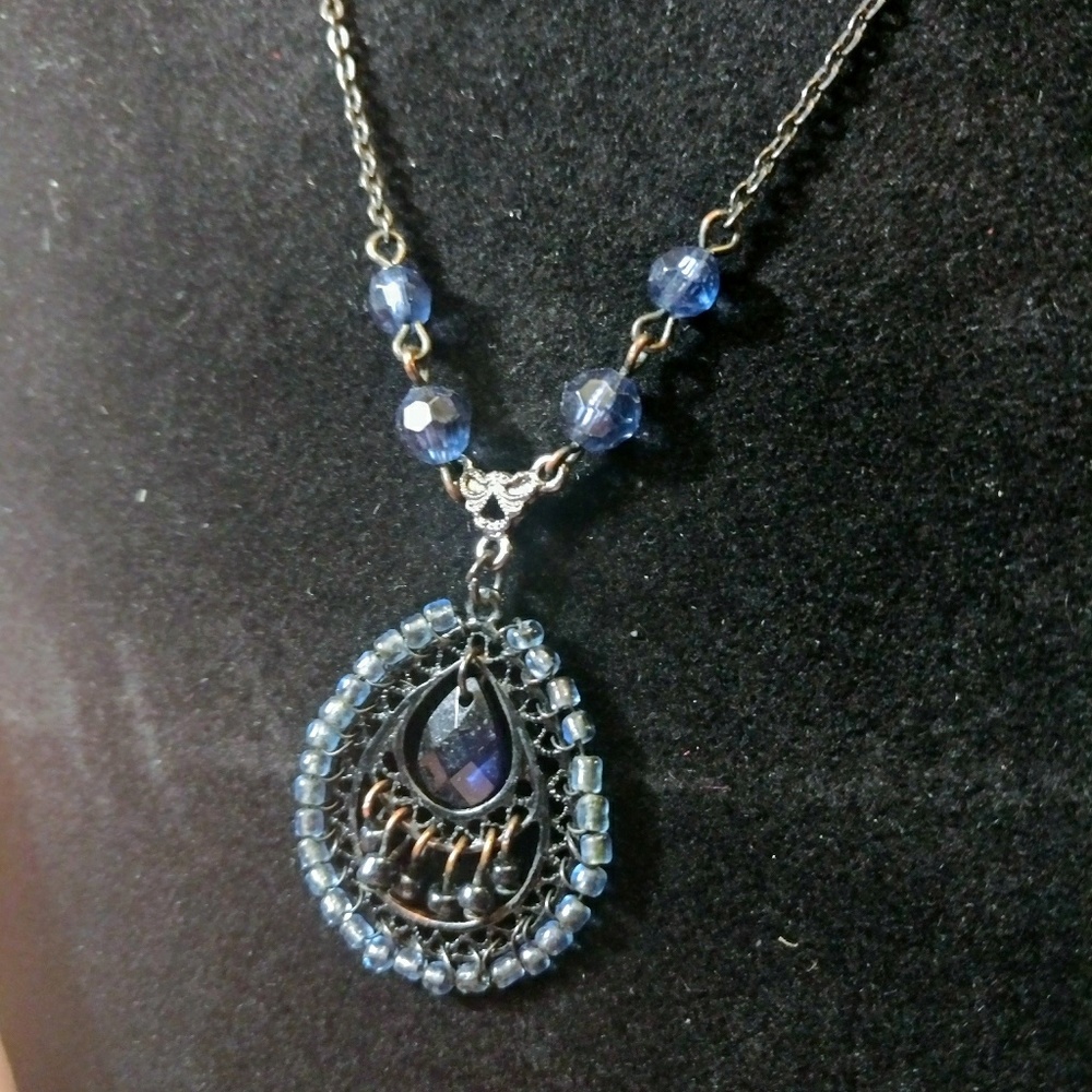 Vintage Beaded Pendant with Dark Blue Accents